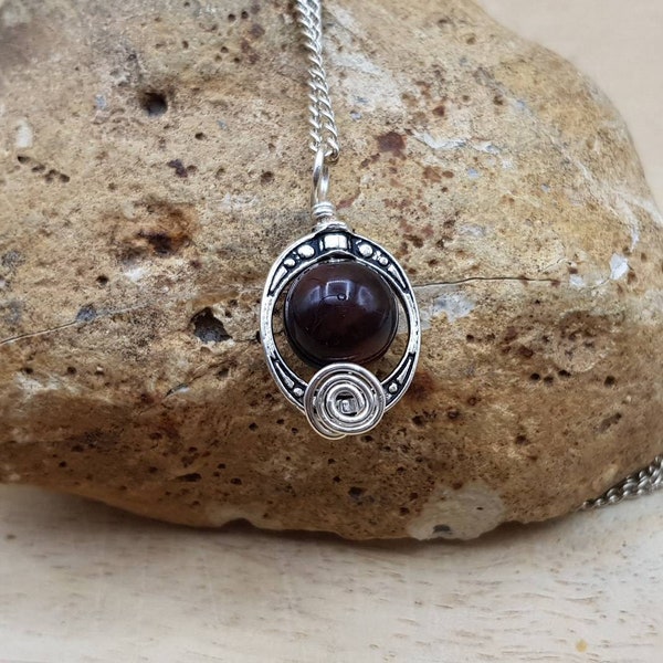 Small Red black Sardonyx pendant. Reiki jewelry uk. August birthstone. Silver plated Wire wrapped pendant. 10mm stone. Oval frame necklace