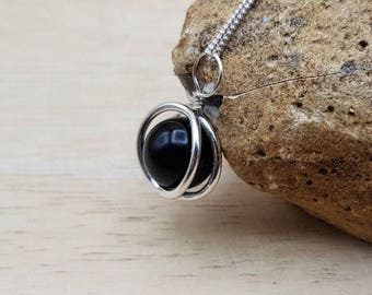 Small Black Shungite circle pendant necklace. Reiki jewelry. 10mm stone. Sterling silver 3D round frame necklace.