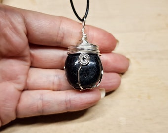 Nuummite pendant necklace. Black 'Sorcerers stone'. Reiki jewelry uk. Unisex Silver plated Wire wrapped nuumite necklace