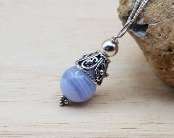 Small Blue lace agate pendant necklace. Reiki jewelry uk. Pisces jewelry. Bali silver cone necklace