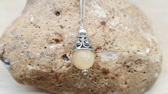 Small Aragonite pendant, yellow rare crystal Capricorn Jewellery