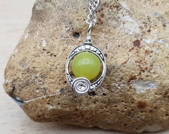 Small green Peridot pendant necklace. August birthstone. Crystal Reiki jewelry uk. Silver plated minimalist frame necklace
