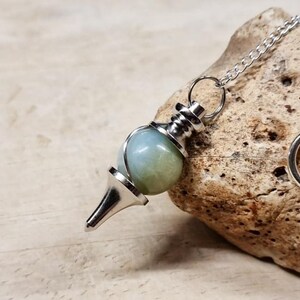 Amazonite Pendulum. Dowsing Virgo Reiki crystals uk. Pale green Semi precious stone Wire wrapped pendulums