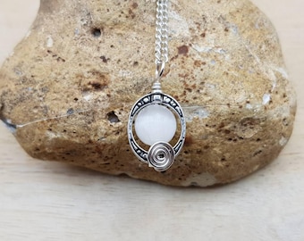 Small Selenite Pendant. Crystal Reiki jewelry uk. Silver plated oval frame necklace. Wire wrap pendant. Empowered crystals