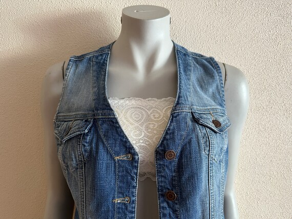Gilet en jean femme sale