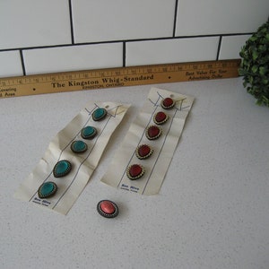 May include: Two cards of vintage buttons. One card has six teal blue buttons with gold trim. The other card has six red buttons with gold trim. The cards are labeled "Bee Hive".