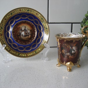 Exceptional Antique Imperial & Royal Porcelain Manufactory Vienna Footed Demitasse Set Napoleon Two Scenes Intricate borders early 20th c.