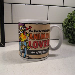 vintage « Vous savez que vous êtes un amoureux des animaux quand... » Mug Ganz Korea aux couleurs vives enveloppant le cadeau de la niche climatisée du dessin animé