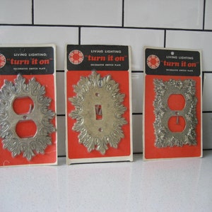 CHOICE Vintage Living Lighting Turn It On Decorative Metal Switch Plate Never opened Flowers Flames c.1960s-70s Trip Switch retro home gift