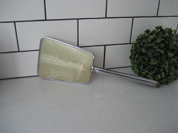 Vintage Art Deco hand mirror Guilloche style Fabric behind plastic Skyscaper Chartreuse undertones Ivory Silvertone metal Grey Gardens style