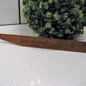 Abrecartas vintage publicitario regla de madera Elias Brothers Montreal 512 Rue McGill Importadores en gros retro office Accessory Mercantil