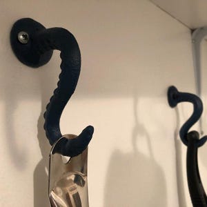 Gancho de pared con forma de tentáculo de pulpo (18 colores)