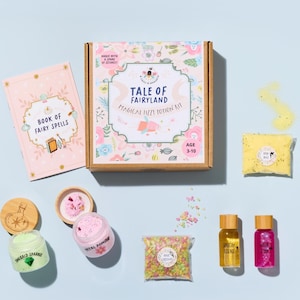 May include: A Tale of Fairyland Magical Fizzy Potion Kit for ages 3-10. The kit includes a book of fairy spells, jars of emerald sparkle and petal powder, and bottles of sunbeam and moon glow potions. Also included are colorful sprinkles and a bag of yellow fizzy powder.