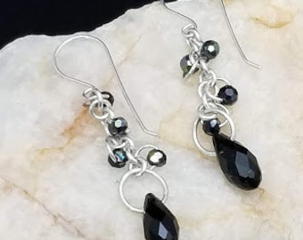 Sterling silver and black glass chain dangle earrings
