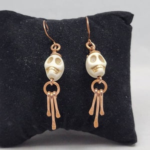 White reconstituted stone sugar skull, hammered copper dangle earrings