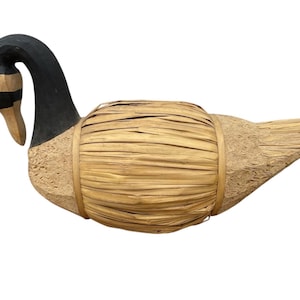 Large vintage straw, cork, and wood duck decoy