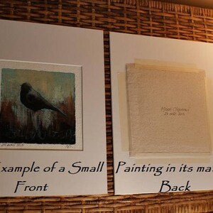 May include: A black and white illustration of a bird on a textured background. The image is framed and matted. The front of the frame shows the image and the text "Example of a Small Front". The back of the frame shows the text "Painting in its mat. Back".