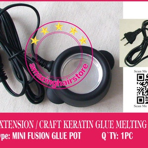Könnte beinhalten: Schwarzer elektrischer Klebstoffschmelztopf mit silbernem Metalleinsatz. Der Topf hat ein Kabel mit einem Stecker für europäische Steckdosen. Der Text auf dem Bild lautet "HAIR EXTENSION / CRAFT KERATIN GLUE MELTING TOOLS Type: MINI FUSION GLUE POT Q'TY: 1PC"