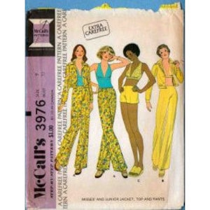 May include: A vintage McCall's sewing pattern for a women's outfit. The pattern includes a jacket, top, and pants. The pattern is for a carefree style and is extra carefree. The pattern is for sizes 6-14.