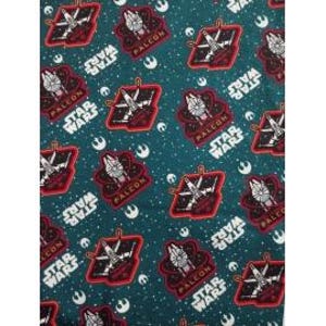 May include: Teal fabric with a repeating pattern of the Millennium Falcon spaceship and the words "Star Wars." The design includes red, white, and black elements, along with white stars and the Rebel Alliance symbol.