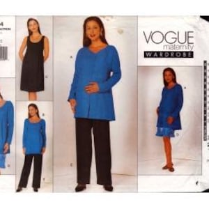 May include: Vogue maternity wardrobe sewing pattern 2104. The pattern includes options for a blue tunic, black pants, and a denim skirt. The cover features images of the finished garments on models. The pattern size range is 16-20-22.