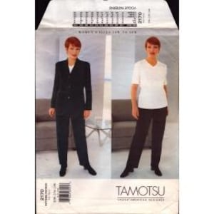 May include: Vogue 2170 sewing pattern for women's sizes 14 to 16. The pattern features a suit with a blazer and pants, and a separate top and pants. The image shows two women modeling the outfits. The brand name "TAMOTSU" is visible.