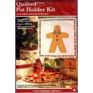 May include: A Quilted Pot Holder Kit with a gingerbread man design. The kit includes fabric and instructions for easy paper piecing. The packaging is red and features a finished pot holder, a plate of cookies, and a decorative container.