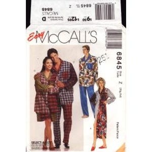May include: Sewing pattern for a pajama set with a long-sleeved shirt and pants. The pattern includes a floral print and a plaid print. The pattern is for sizes S-M-L.