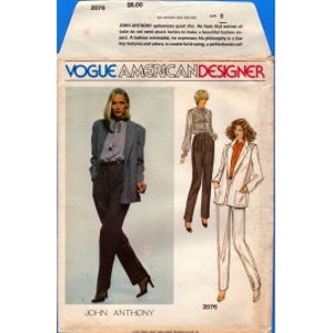 May include: A vintage sewing pattern for a women's pantsuit by John Anthony. The pattern includes a blazer and pants. The pattern is for sizes 6-14.