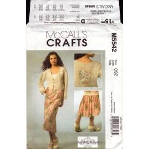 May include: A McCall's Crafts sewing pattern, M5542, featuring a woman wearing a cardigan and floral skirt. The pattern includes images of the finished garments. The price is $15.95.