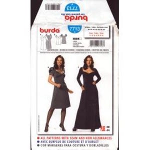 May include: A Burda sewing pattern packet, model 7713, featuring illustrations of two different dress designs. The packet includes text in English, French, and Spanish, with size information and a barcode. The dresses are shown in a dark gray and black color.