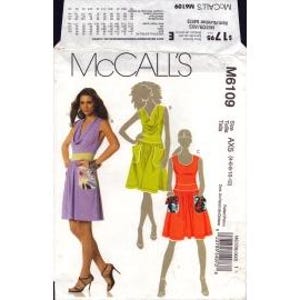 May include: A McCall's M6109 sewing pattern envelope featuring illustrations of three sleeveless dresses. One dress is light purple with a wide waistband, one is lime green with a cowl neckline, and one is orange with a scoop neckline and pockets.