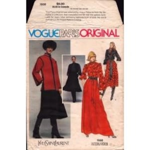 May include: A vintage Vogue Paris Original sewing pattern featuring designs by Yves Saint Laurent. The pattern packet displays images of a red jacket and black skirt ensemble, a black coat, and a red dress with a floral pattern.