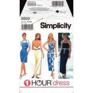 May include: Simplicity sewing pattern 8869 features four dress designs. The pattern envelope is white with illustrations of the dresses and the text "Simplicity" and "1 HOUR dress". The size range is AA, XS-M.