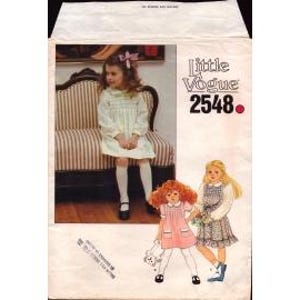 May include: A vintage sewing pattern for a girls' dress, Little Vogue pattern number 2548. The pattern shows three girls wearing different variations of the dress, one with a white dress, one with a pink dress, and one with a blue and white dress.