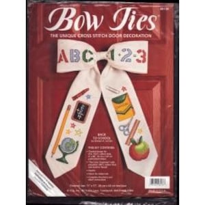 May include: A white bow tie cross stitch pattern with a school theme. The pattern includes the letters ABC and the numbers 123, along with images of a globe, pencils, scissors, an apple, and a chalkboard. The text "Race to School" is also included.