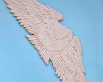 EMBOSSED EAGLE CARVING