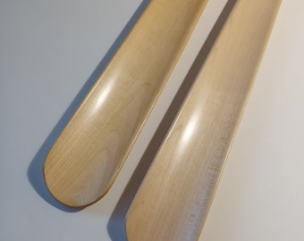 Shoe horn made of Canadian maple. 12, 15, 18, 22, 30 inches long.