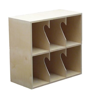 May include: A light wood shelf unit with six compartments, each with a cutout for holding items. The shelf unit is made of plywood and has a natural finish.