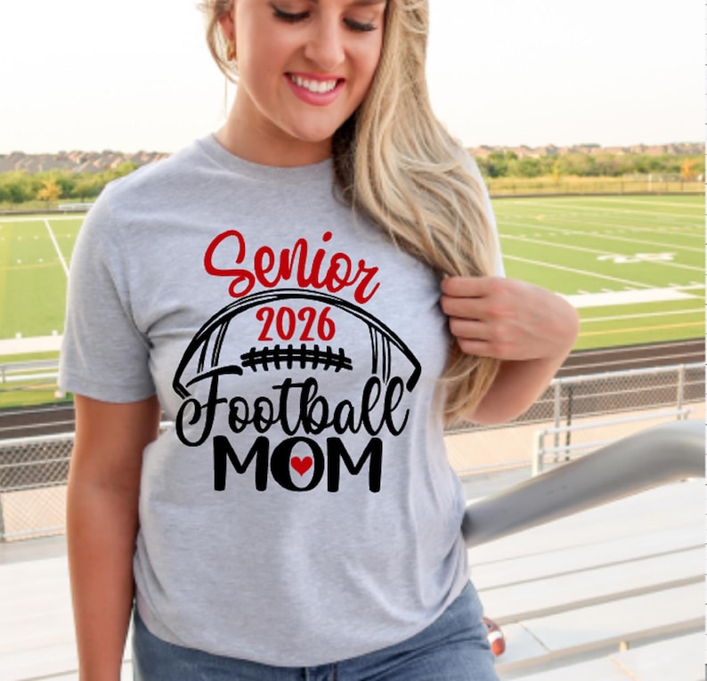Senior Football Shirt Senior Football Mom T-Shirt Senior 2026 Football Shirts Bella Canvas T-shirt Customize name number and colors Athletic Heather