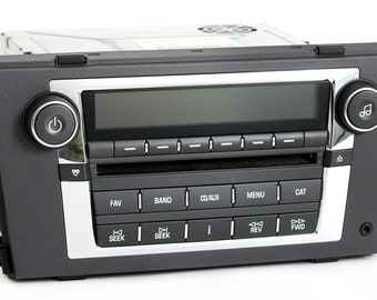 2006 Cadillac DTS Radio Am Fm 6 Disc mp3 CD Player with Auxiliary Input Upgrade Part Number 15847689