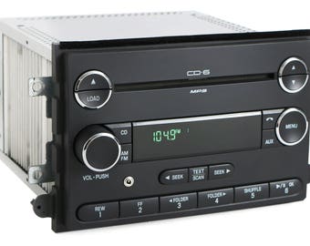 Mercury Milan Ford Fusion 2006-2009 Radio AMFM 6 Disc CD Player w Aux Input Upgrade Part Number 8E5T-18C815-AG