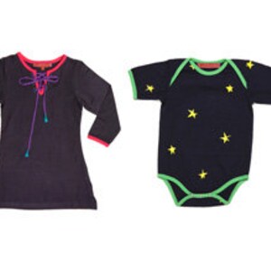 May include: A selection of children's garments. Includes a red star-patterned pyjama set, a dark blue dress with pink trim, a navy blue babygrow with yellow stars, and a brown shirt with an elephant graphic.