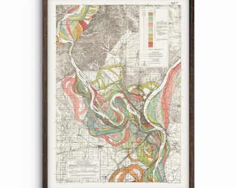 Könnte beinhalten: Gerahmter Vintage-Karten-Druck mit einer detaillierten geologischen Untersuchung mit farbenfrohen, sich windenden Flussmustern in Rot, Grün und Gelb. Die Karte ist vor einem neutralen Hintergrund in dunklem Holz gerahmt.
