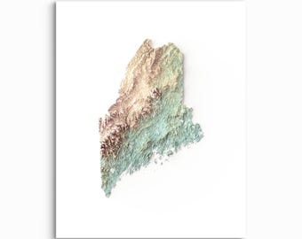 May include: A topographic map print of the state of Maine featuring a relief effect. The map displays a color gradient transitioning from light tan and brown in the mountainous northern and western regions to a soft teal green in the southern areas.