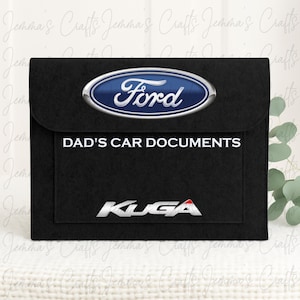 May include: Black felt car document holder with a silver Ford logo and the words "DAD'S CAR DOCUMENTS" and a silver KUGA logo.