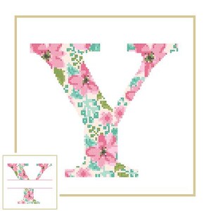 May include: A cross-stitch design of the letter "Y" filled with pink floral patterns, green leaves, and light blue accents. The letter is set against a white background within a gold-colored frame. A smaller version of the design is in the lower left corner.