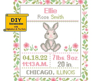 May include: A cross-stitch pattern featuring a bunny rabbit, flowers, and the text "Ellie Rose Smith", "04.18.22 7lbs. 9oz. 11:13 A.M. 20 in. CHICAGO, ILLINOIS".