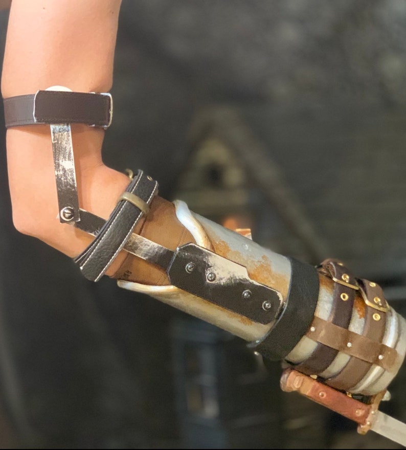 Zombie hunter prosthetic arm. Merle�s weapon of choice Etsy