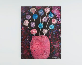 May include: A painting of a pink vase with a textured surface filled with a bouquet of pink, blue, and purple flowers on a dark background with purple and blue splatters.